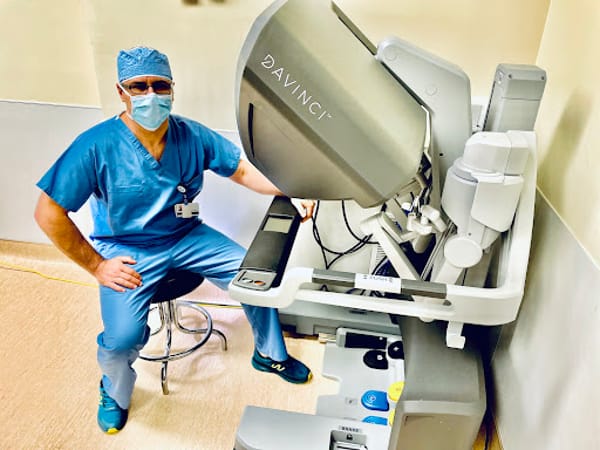 Dr. Marius Calin M.D. F.A.C.S. F.A.S.M.B.S. M.B.S - F.P.D A.B.O.M